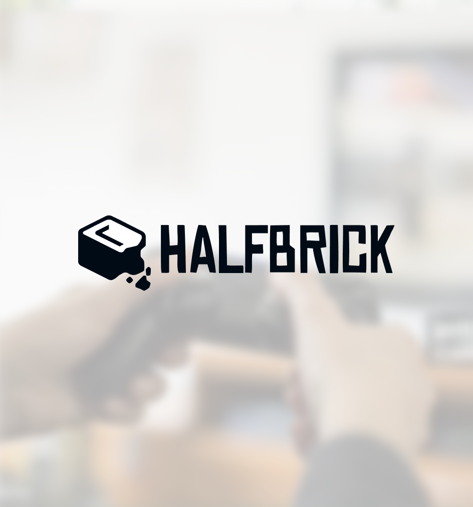 OT-graphic-customer-feature-halfbrick Blurred image of a person holding a gaming controller with the Halfbrick logo overlaid on top.