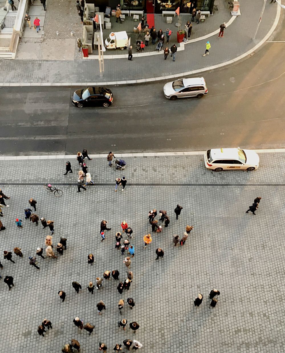 Overhead photo of people crossing a street